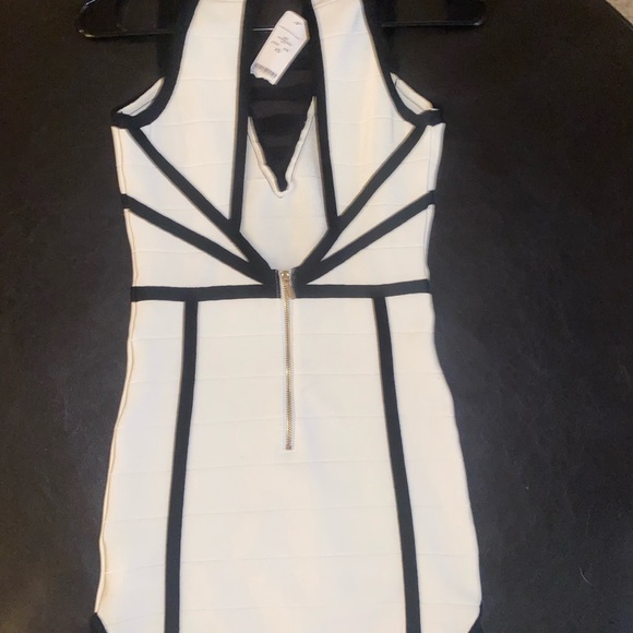 Extra small beautiful and super sexy Bebe dress with tags attached. ❤️ - Picture 3 of 5